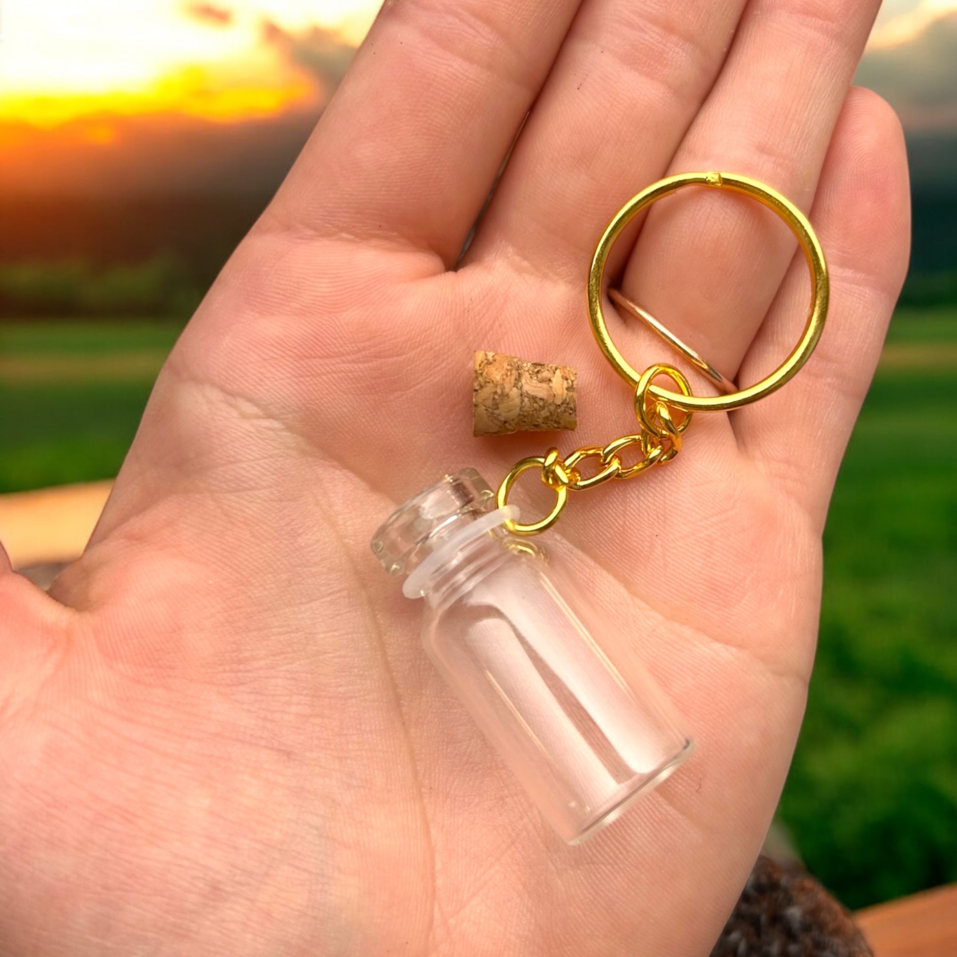 Empty vial keychain for a Marimo mate 