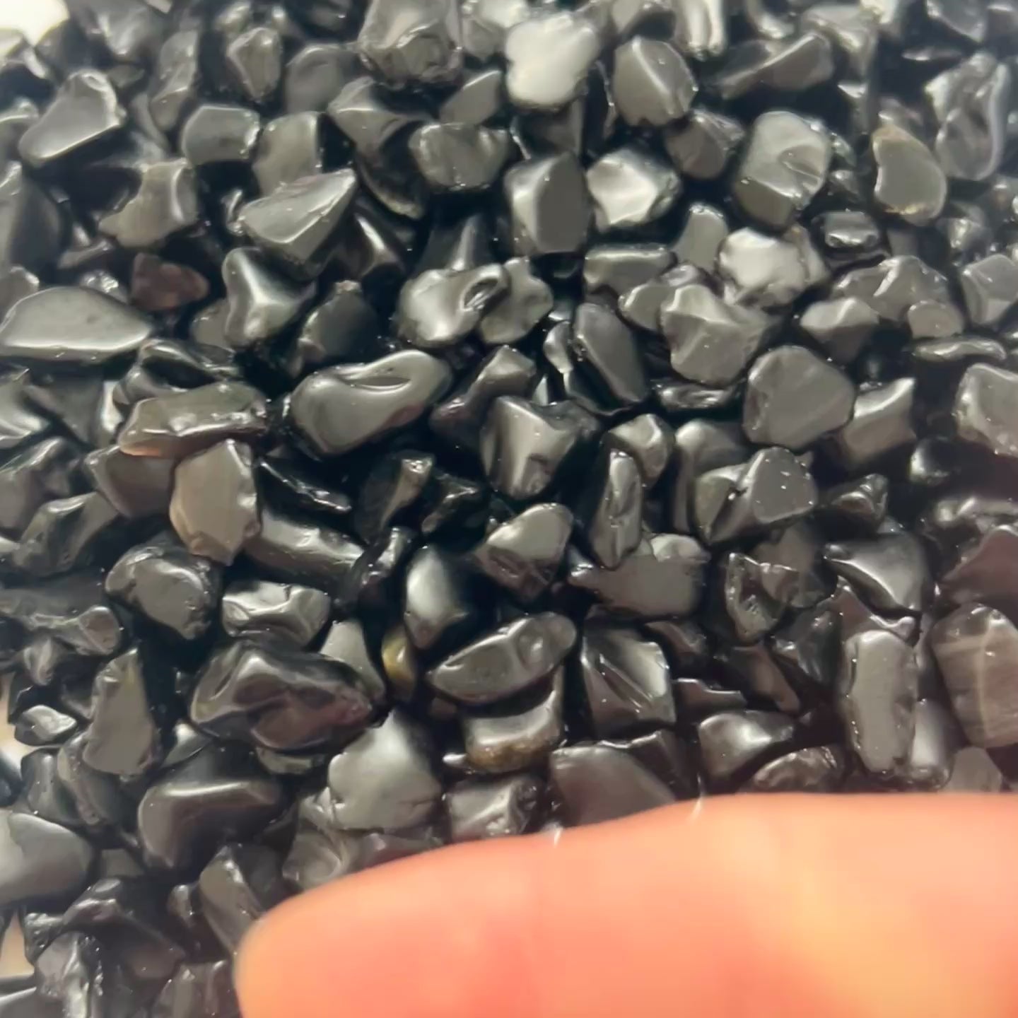 Black obsidian gemstones displayed
